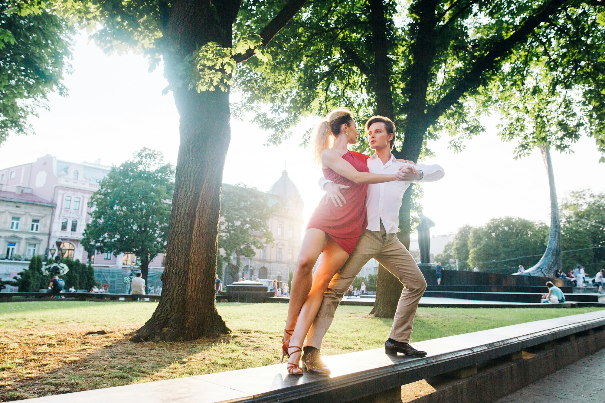 Passionate hipster couple dancing in the streets, summer honeymoon of dancers